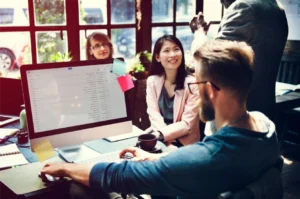 SEO team working together in an office.