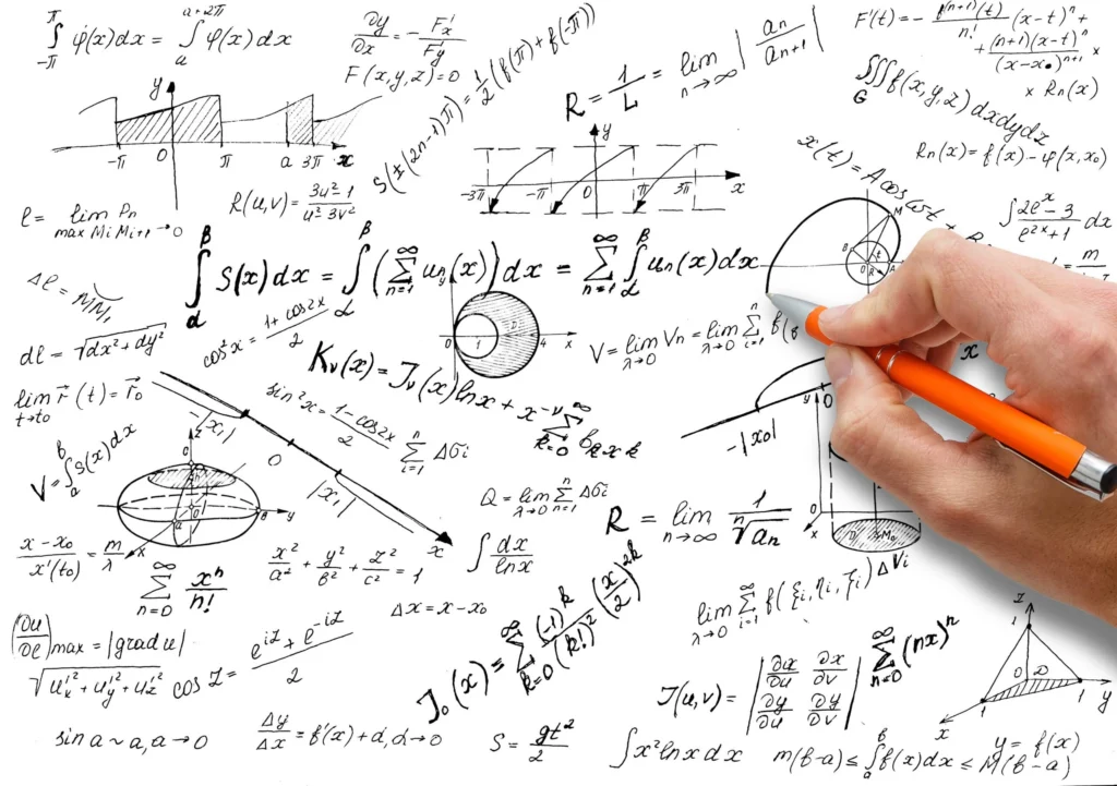 A man's hand writing out complex math calculations. What to do if your Google rankings fluctuate after a major algorithm update