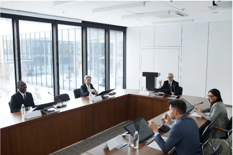 People all around an office on their computers.