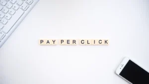 Pay per click spelled out in Scrabble tiles.